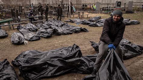 fake body bag ukraine|Video of man smoking among body bags is from a 2020 music video.